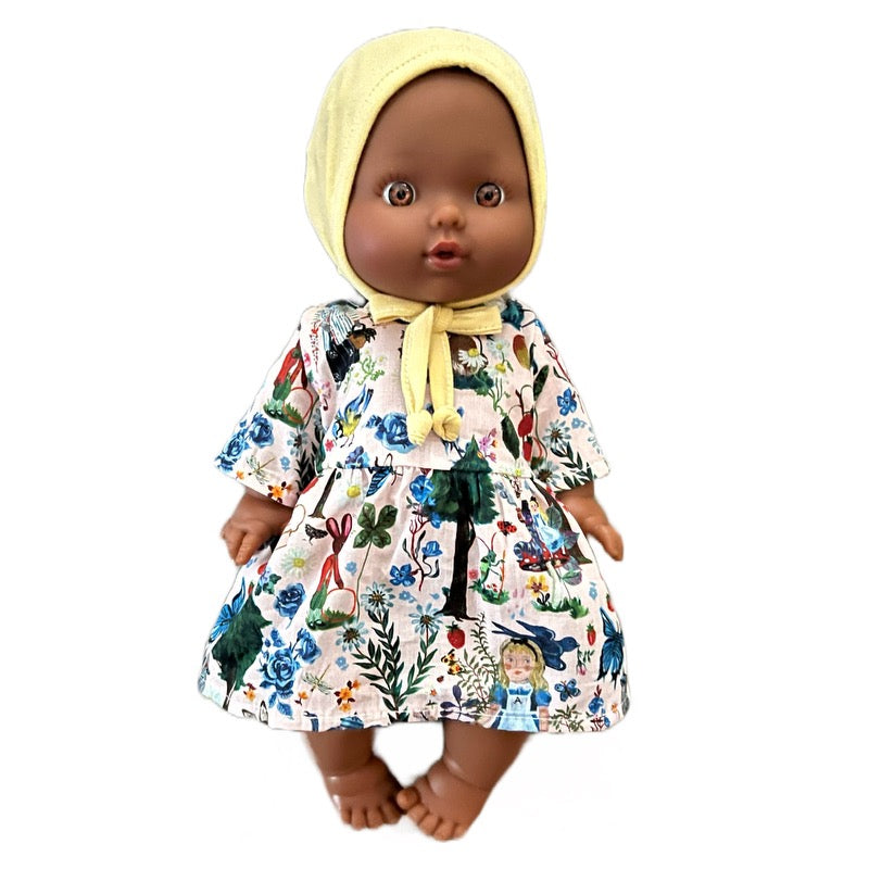 Minikane Bath Baby Girl Doll in Nathalie Lété Dress and Lemon Bonnet · Black